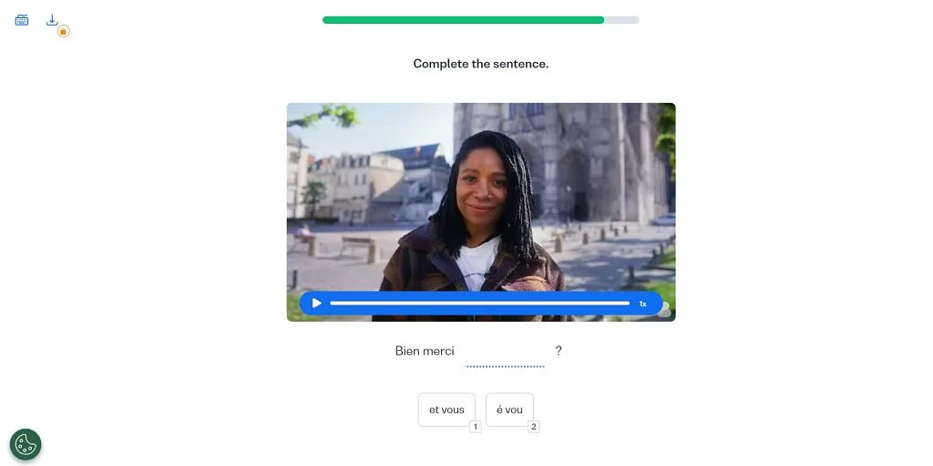 Busuu exercise showing a video of a woman near a Gothic cathedral with a fill-in-the-blank spelling exercise below